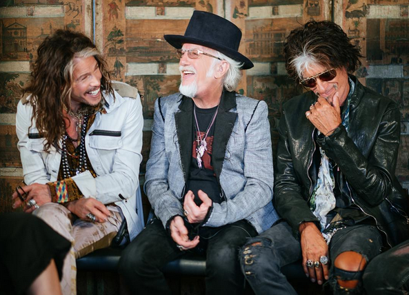 Brad Whitford wearing Silver Luthier jewelry, with Steven Tyler and Joe Perry preparing to rock South America with Aerosmith.